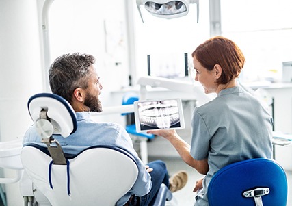 Man getting X-rays at dental office