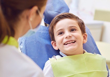 Smiling child in dental chair