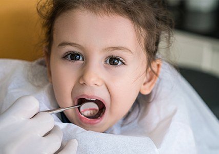 Child receiving dental exam