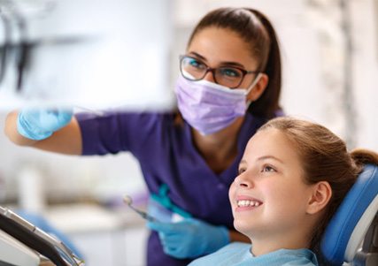 Patient learning about her oral health  