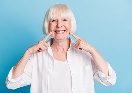 Woman smiling with dentures