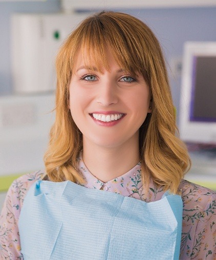 Smiling woman in dental chair