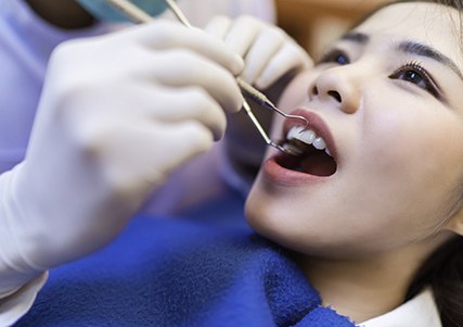 Woman having a dental checkup in Saginaw