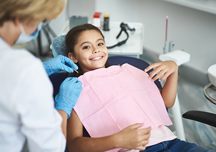 Child smiling at the dentist