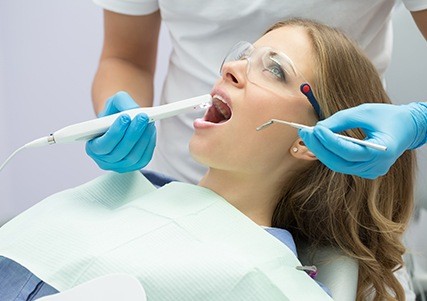 Dentist capturing intraoral images