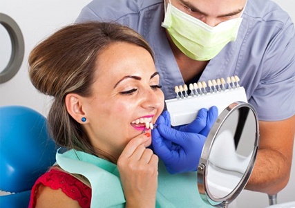 woman getting veneers in Saginaw