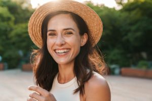 Woman showing off her healthy smile while outside