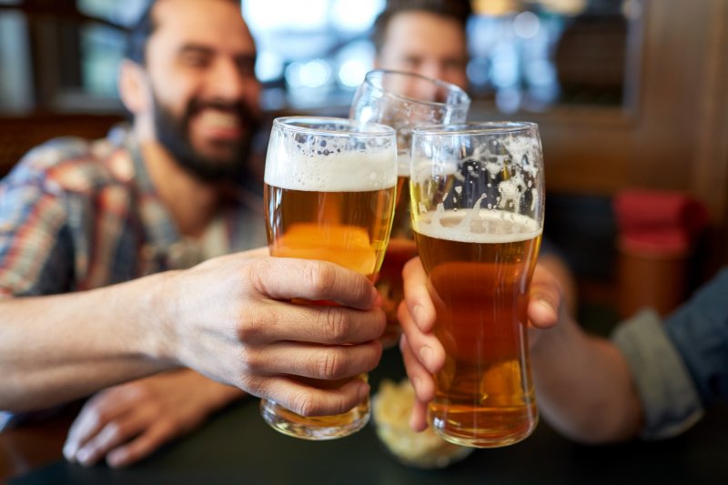 Friends drinking beer together