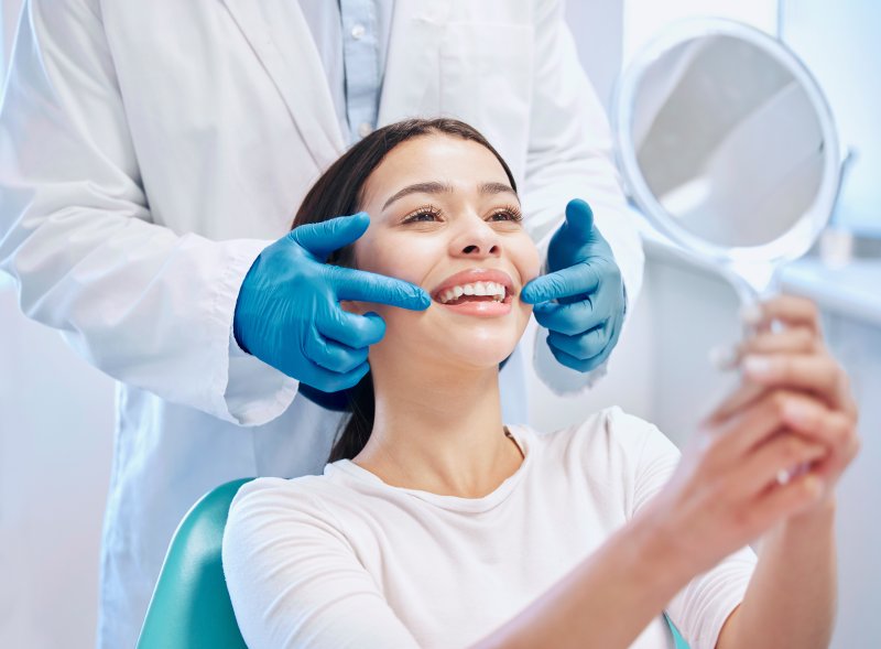 patient talking to their dentist